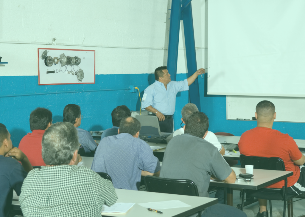 mechanic teaching a class